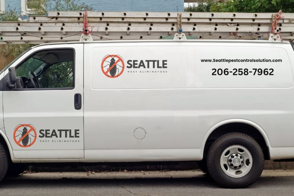 White van with "Seattle Pest Control Service" branding, parked in Seattle, WA, advertising pest control solutions.